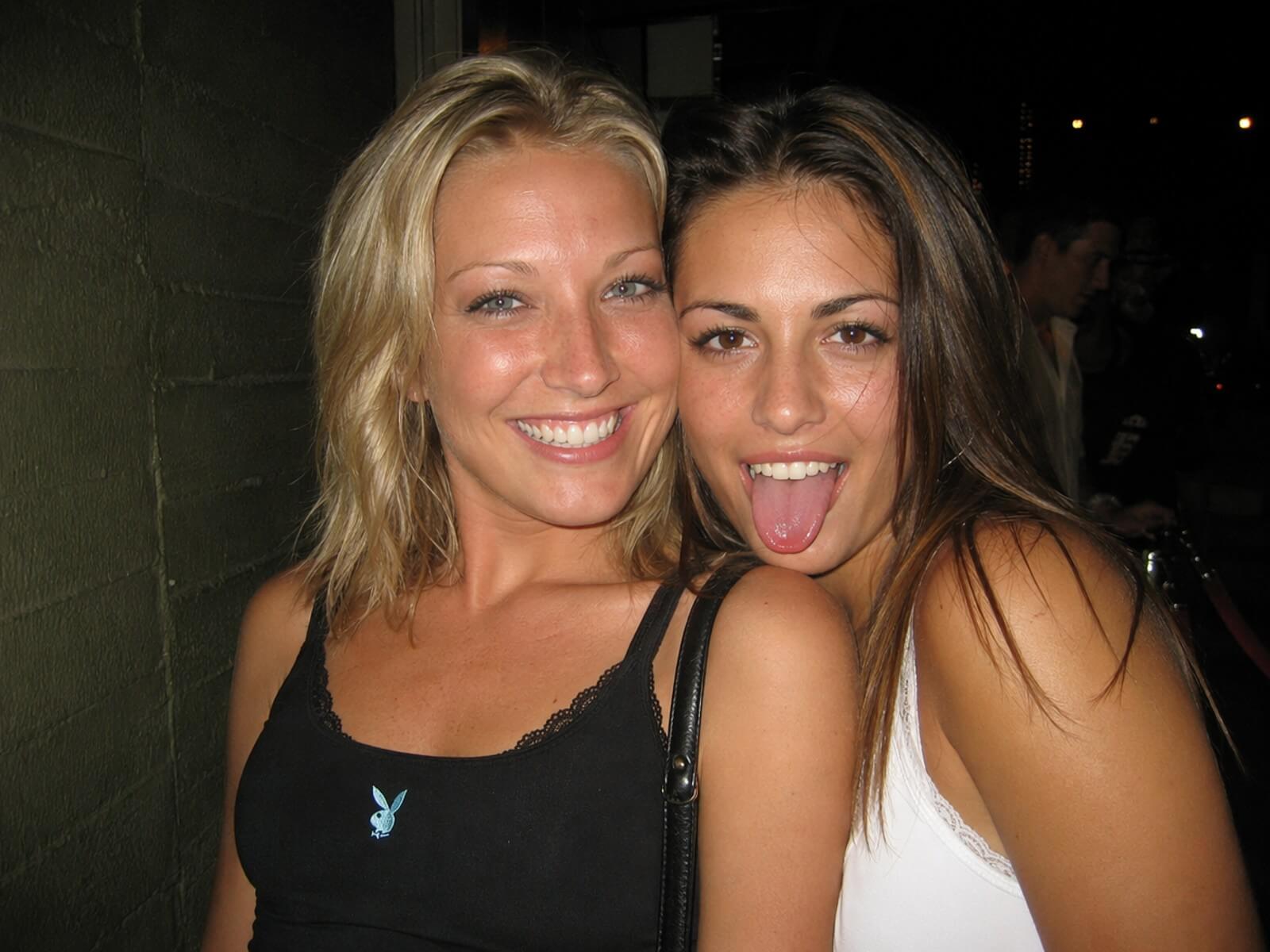 A photorealistic snapshot of two friends outside a venue at night generated with gpt image 2 on clipfly