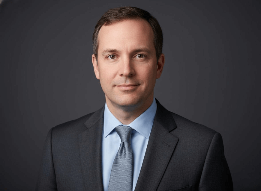 A linkedin headshot of a consulting experts wearing suits