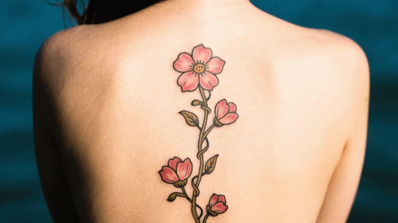 Birth flower tattoo on the spine